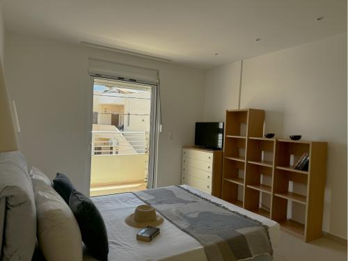 bedroom_1_with_private_tv_and_private_balcony